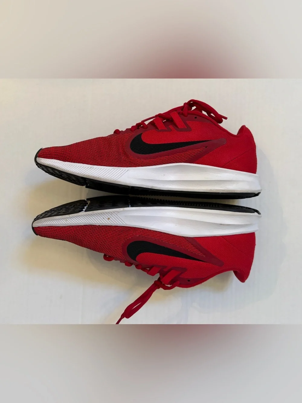 Nike Men’s Red Athletic Running Shoes with Black Swoosh